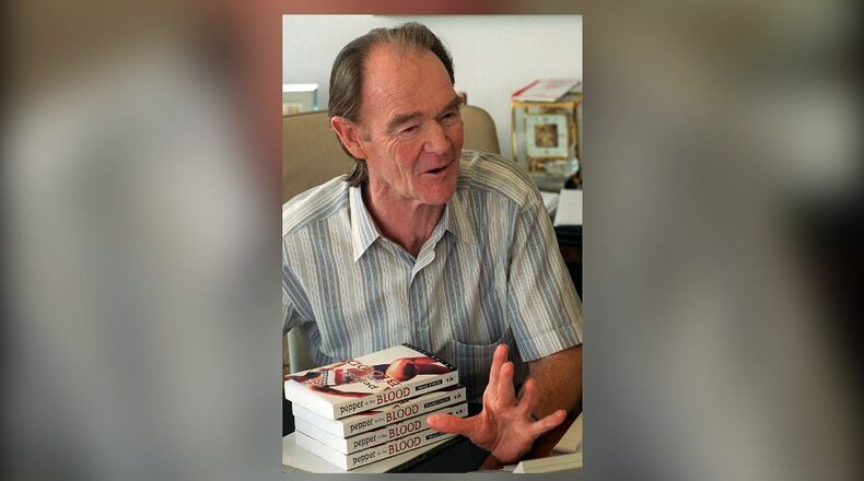Brian Dyson, the former head of Coca-Cola Enterprises, speaks about how he drew from his life growing up in Argentina and on his experiences as an athlete to write a book about an Olympic hopeful. (Nick Arroyo/AJC 1996)
