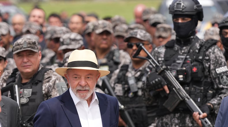 Brazilian President Luiz Inacio Lula da Silva arrives for a ceremony to announce a new security plan to combat organized crime in Rio de Janeiro, Friday, Sept. 18, 2026. (AP Photo/Silvia Izquierdo)