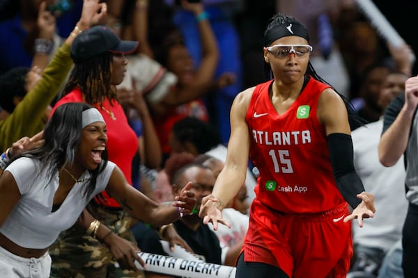 Atlanta Dream guard Allisha Gray (15) reacts after a three pointer during the second half of a WNBA basketball first-round playoff game against the Indiana Fever at Gateway Center Arena on Thursday, Sept. 18, 2024, in Atlanta. (Miguel Martinez/ AJC)