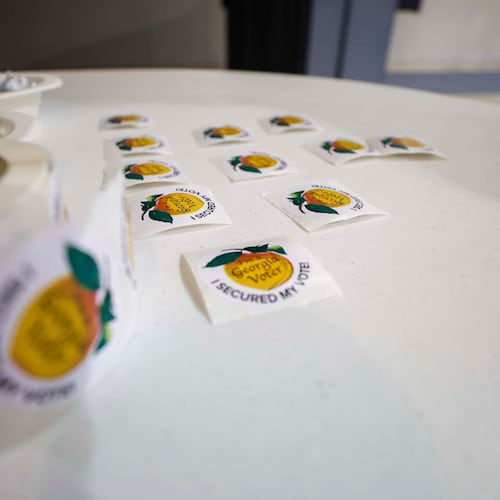 Voting stickers are placed and ready to be handed out at Calvary Baptist Church in Austell during the Georgia Public Service Commission’s special election for two of the five seats on Tuesday, June 17, 2025.
(Miguel Martinez/ AJC)
