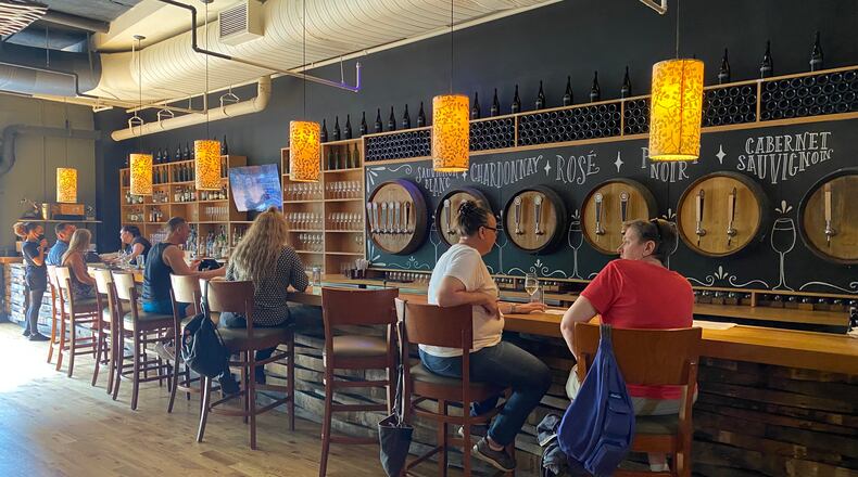 A handful of City Winery patrons in Atlanta enjoy a drink at the bar earlier this year.
Ligaya Figueras / ligaya.figueras@ajc.com