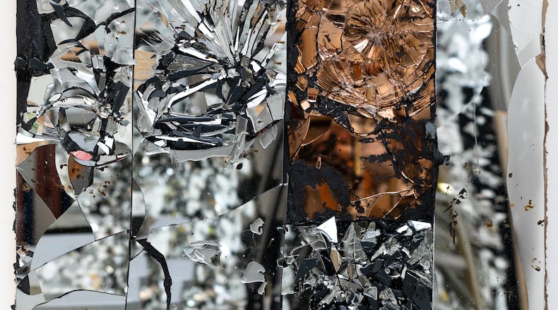 "Pink Moon (for Astrid)," mirror and oil on birch (detail), is one of Michael David's works on display at the Bill Lowe Gallery. (Photo by Pete Mauney)