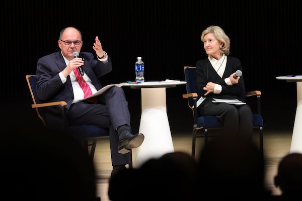 High Representative for Bosnia and Herzegovina Christian Schmidt, left, speaks with former U.S. Ambassador to NATO and U.S. Senator Kay Bailey Hutchison during a panel discussion at the NATO Parliamentary Assembly in Dayton, Ohio, Friday, May 23, 2025. (AP Photo/Paul Vernon)