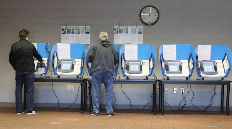People vote in March at Five Forks Library in Lawrenceville during the MARTA referendum. EMILY HANEY / emily.haney@ajc.com