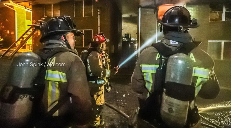 Fire crews arriving Thursday morning at the Villas of Hope Apartments on Holly Street found heavy fire on the back side of one building.
