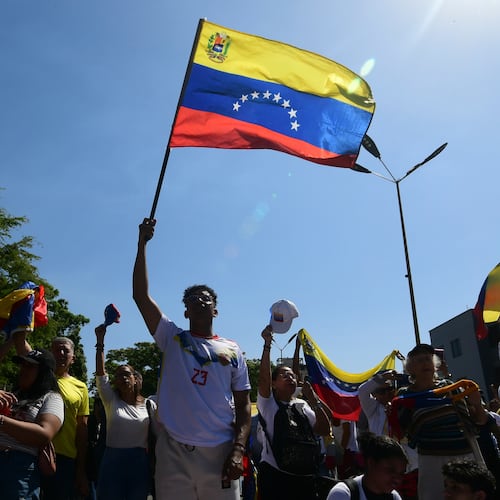 People attend a student-led march on National Youth Day to call for the release of detainees, considered to be political prisoners by their relatives and human rights groups, in Valencia, Venezuela, Thursday, Feb. 12, 2026. (AP Photo/Jacinto Oliveros)