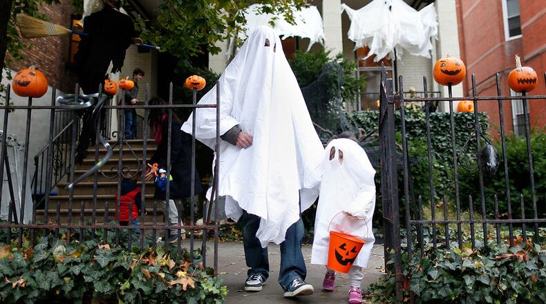 The association lists a few safety tips for parents on the petition, too, urging kids wear clip-on lights or other high visibility aids during nighttime trick-or-treating to avoid auto-related injuries. (Photo by Jemal Countess/Getty Images)