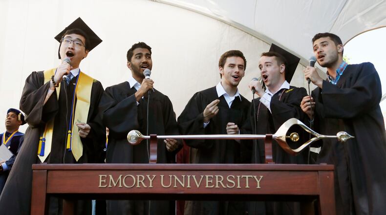 Emory students sing the Alma Mater to close the ceremony. Claire E. Sterk, the university's 20th president, presided over the 174th commencement exercises on Monday, May 13, 2019.  Andrew Young, former Atlanta mayor and civil rights activist, delivered the keynote address.  Bob Andres / bandres@ajc.com