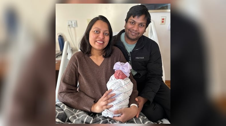 Shikha Goel and Dhruv Goyal with their newborn baby girl on Jan. 1, 2024. The baby girl was Northside Hospital Atlanta's first baby delivered in the new year. (Northside Hospital Atlanta)