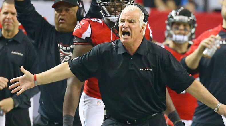 Falcons coach Mike Smith yells during the last game of a tough season.
