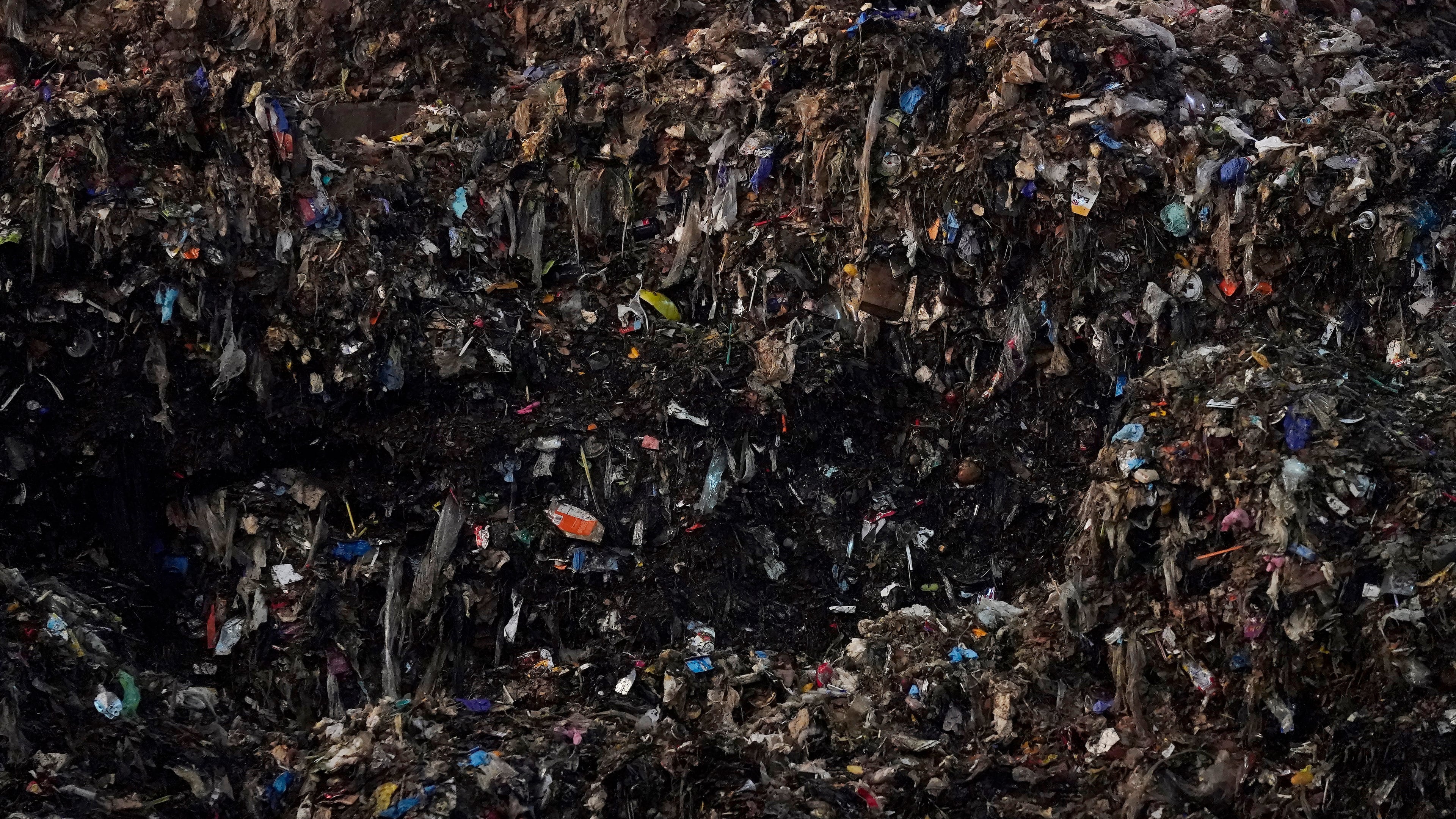 FILE - Shredded organic materials are piled up at a GreenWaste Renewable Energy Digestion Facility in San Jose, Calif., Oct. 27, 2023. (AP Photo/Jeff Chiu, File)