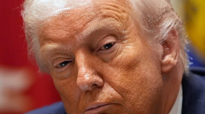 President Donald Trump listens during a roundtable on farm subsidies in the Cabinet Room of the White House, Monday, Dec. 8, 2025, in Washington. (AP Photo/Alex Brandon)