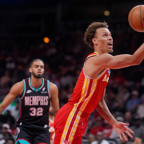 Atlanta Hawks guard Dyson Daniels (5) shoots against the Memphis Grizzlies during the first half of an NBA basketball game, Monday, March 23, 2026, in Atlanta. (Mike Stewart/AP)