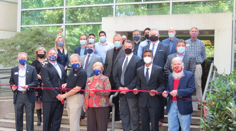 Fusus celebrated the opening of its new office with an official ribbon cutting ceremony on Oct. 1 with Peachtree Corners Mayor Mike Mason, Mayor Pro Tem Weare Gratwick and Councilmember Lorri Christopher. (Courtesy Fusus)