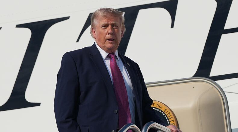President Donald Trump boards Air Force One, Friday, July 3, 2026, at Joint Base Andrews, Md. , for a trip to Mt. Rushmore. (AP Photo/Alex Brandon)