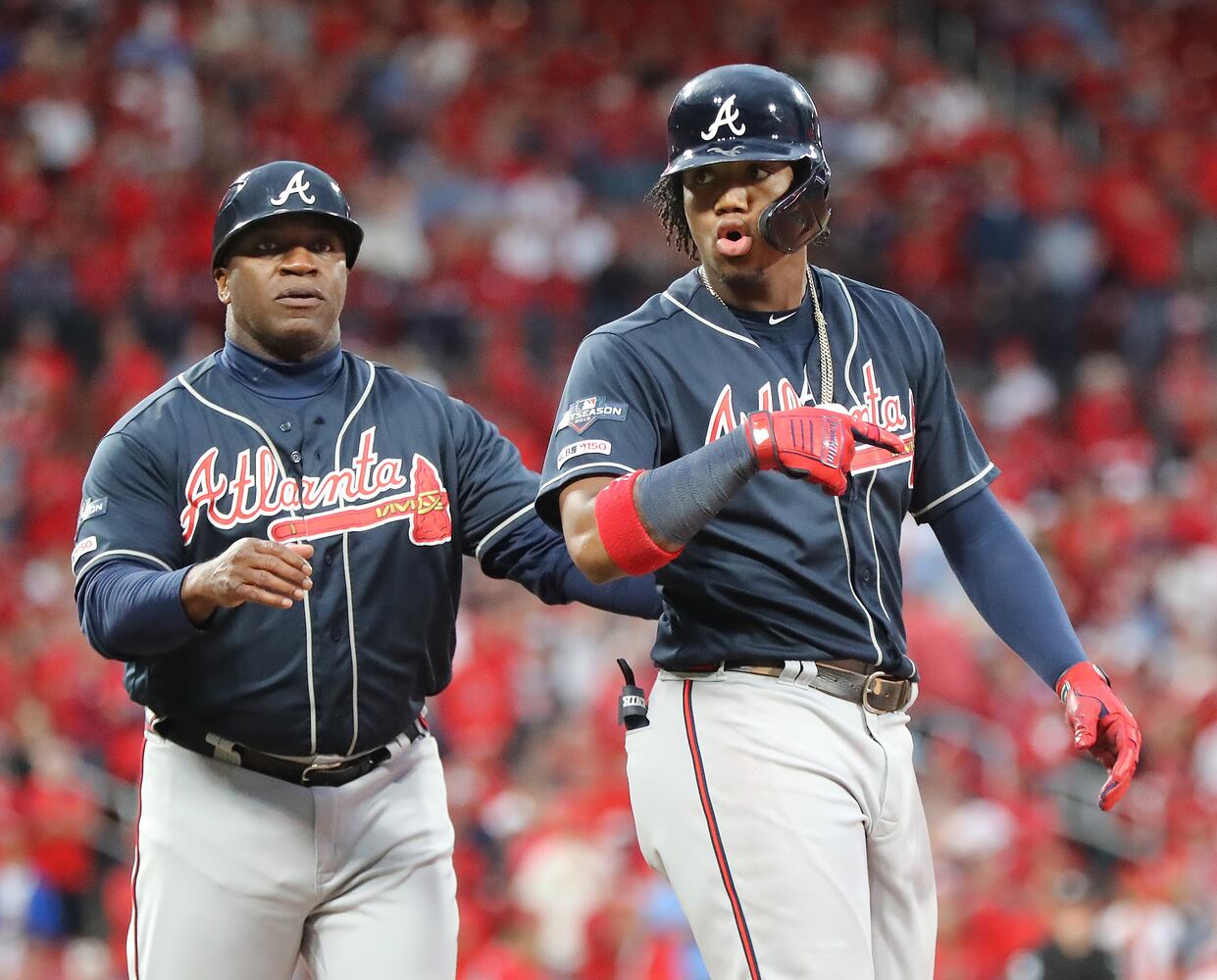 Photos: Braves win in dramatic fashion, lead Cardinals 2-1 in NLDS
