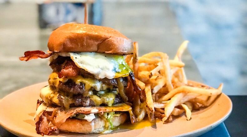 The off-menu Frankenstein burger at Butcher & Brew has three patties — and so much more. CONTRIBUTED BY BUTCHER & BREW