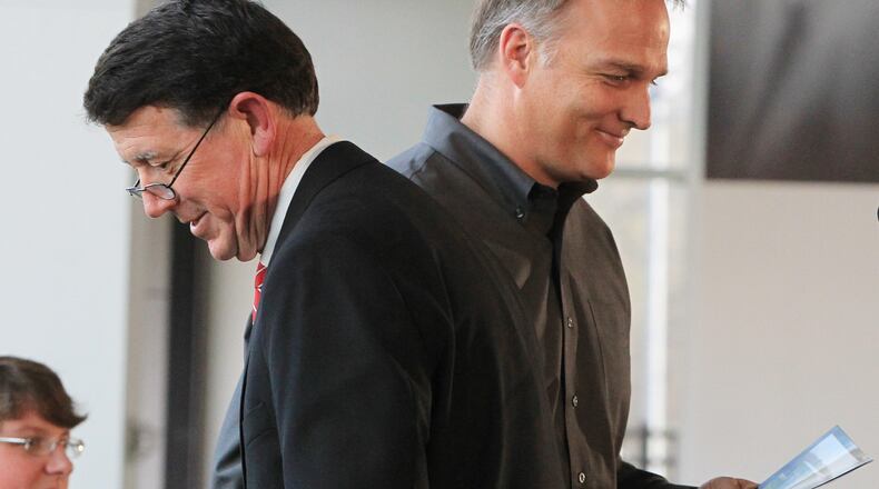 Is Georgia coach Mark Richt trying to send a message to athletic director Greg McGarity?(Curtis Compton/ccompton@ajc.com)