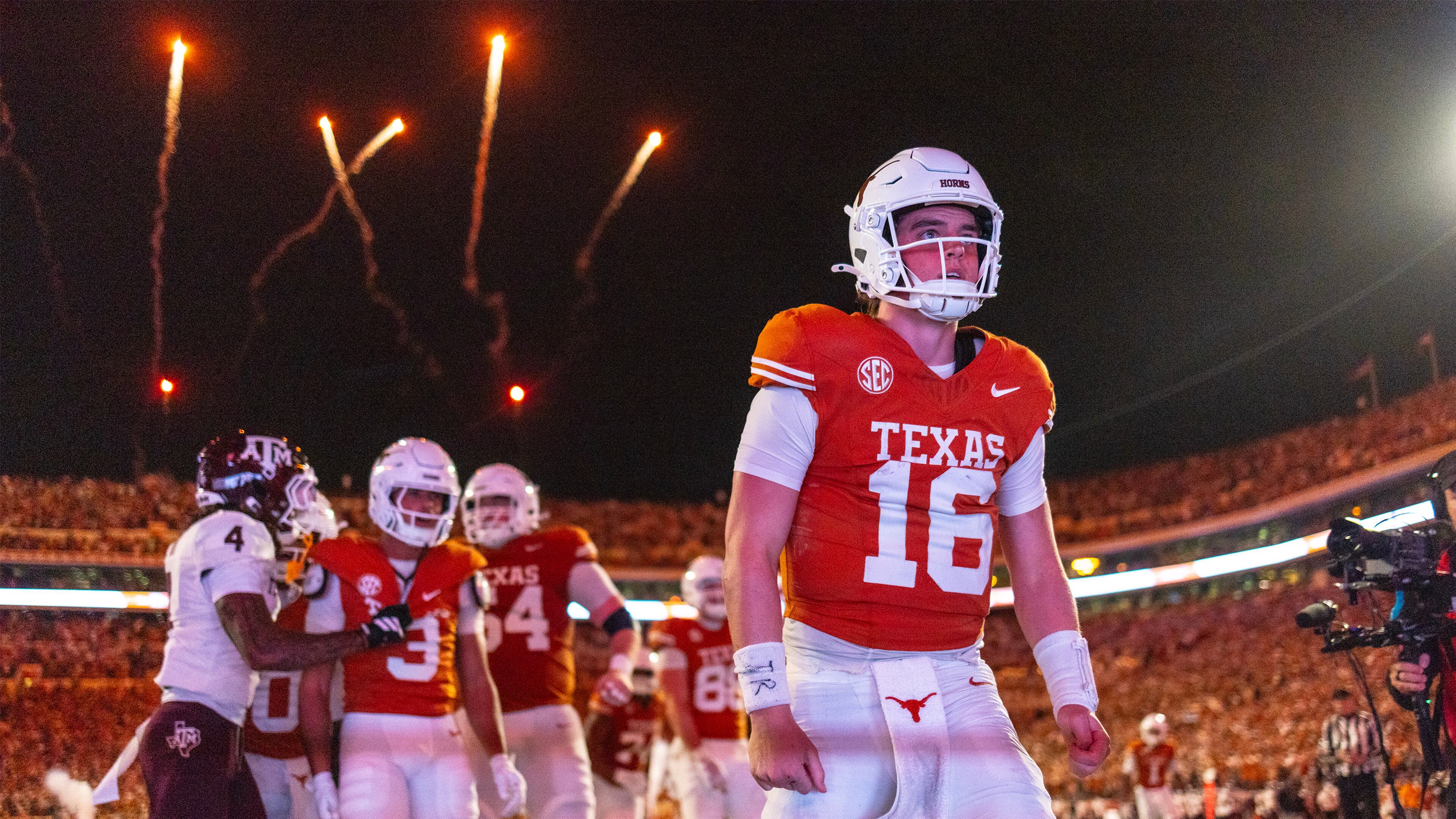 Texas quarterback Arch Manning (16) celebrated a touchdown against Texas A&M during the second half of an NCAA college football game Friday, Nov. 28, 2025, in Austin, Texas. (AP Photo/Stephen Spillman)