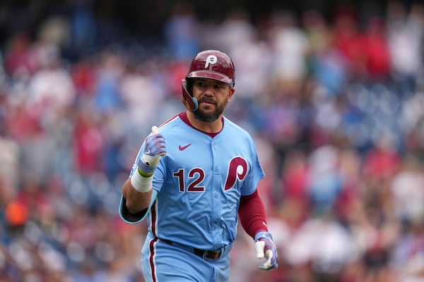 Philadelphia Phillies' Kyle Schwarber reacts after hitting a home run against Atlanta Braves pitcher Pierce Johnson during the seventh inning in the first baseball game of a doubleheader Thursday, May 29, 2025, in Philadelphia. (AP Photo/Matt Slocum)