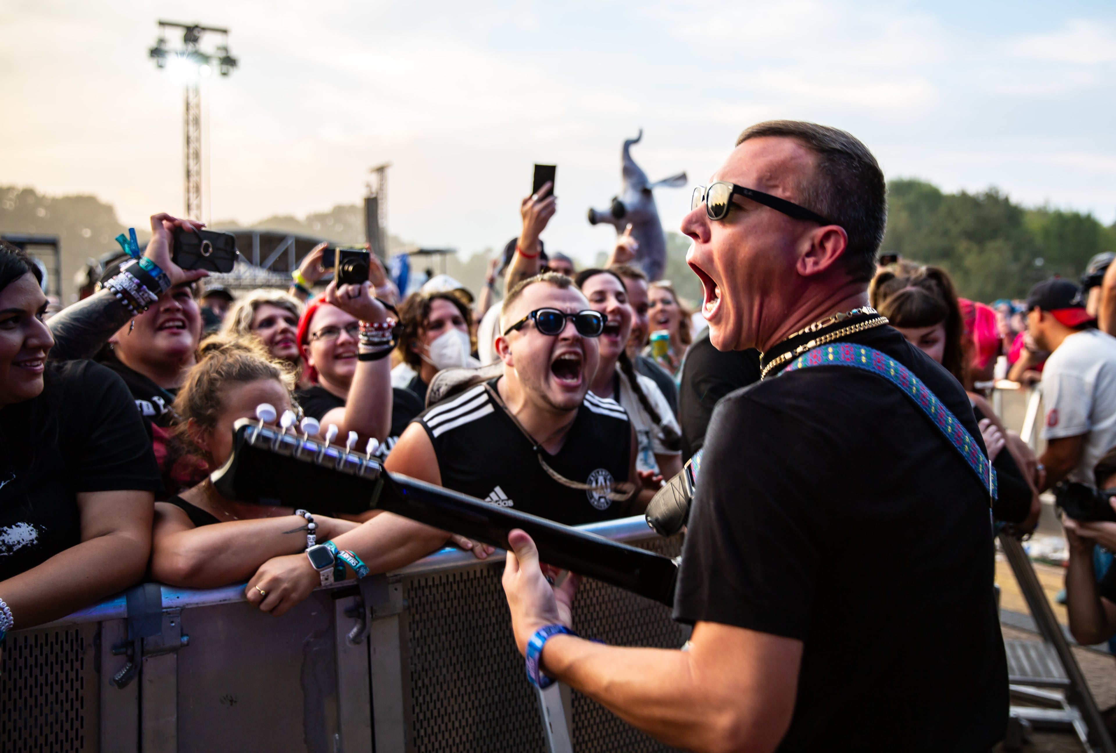 Cage the Elephant brought its action-packed show to the Peachtree stage, full of pyro, leaps and guitarist Brad Schulz joining the crowd while playing on Saturday, Sept. 20, 2025, at the Shaky Knees Music Festival at Piedmont Park in Atlanta. (Ryan Fleisher for the AJC)