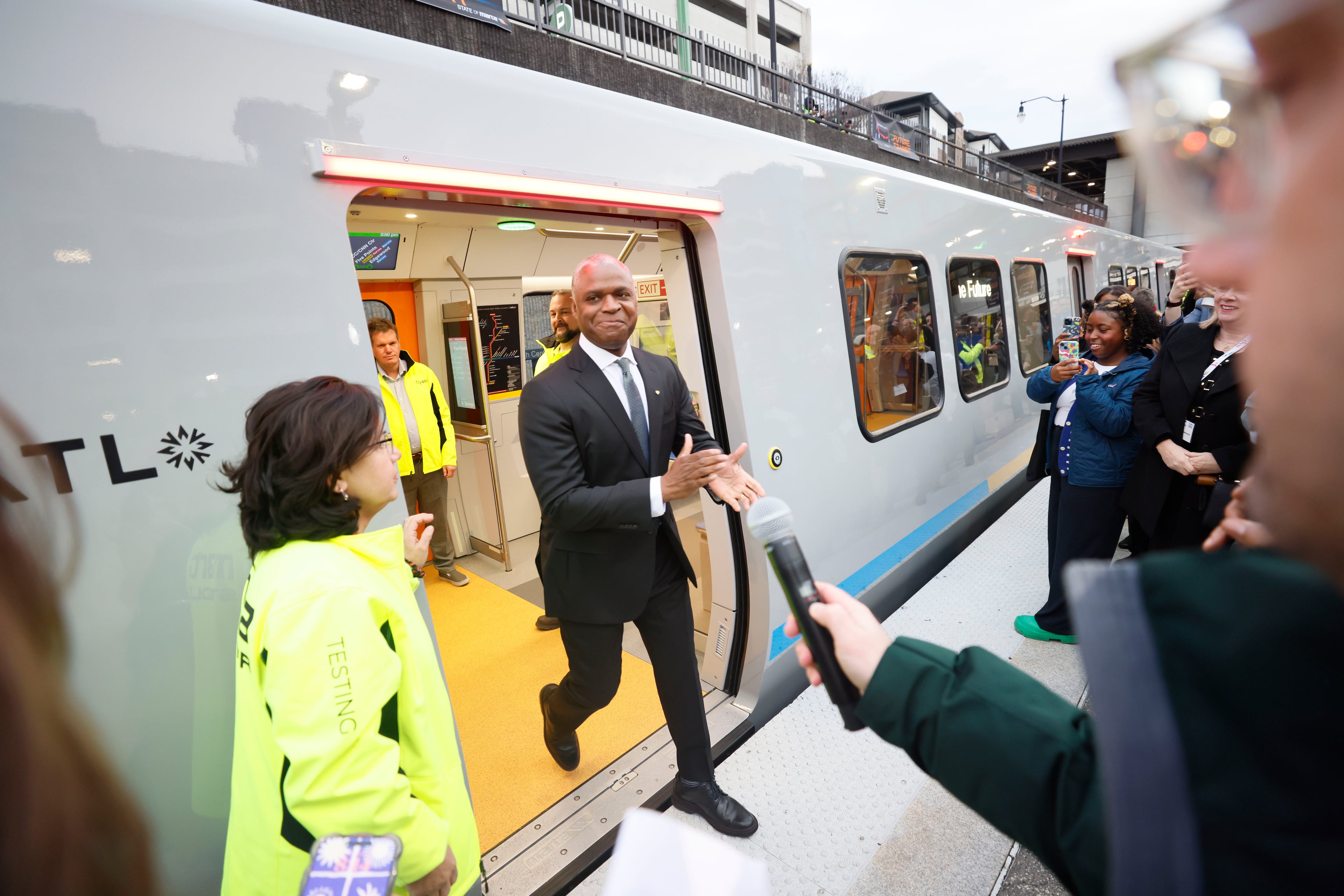 MARTA General Manager and CEO Collie Greenwood, shown here attending the unveiling of new trains in January, is now out as the agency’s chief. (Miguel Martinez/AJC)