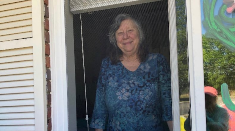 Marsha Tyson during a window visit with her family Mother's Day weekend at her nursing home in Dublin. Tyson has early-onset Alzheimer's and has forgotten her three children over the months of isolation and lockdown. (Pace Tyson / Family photo)