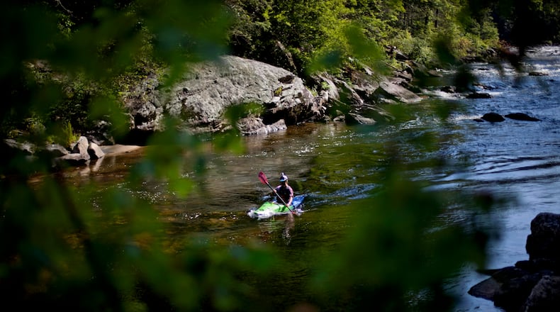 A kayaker passes along Woodall Shoals on the Chattooga River on June 22, 2012, in Clayton, Georgia. (David Goldman/AP)