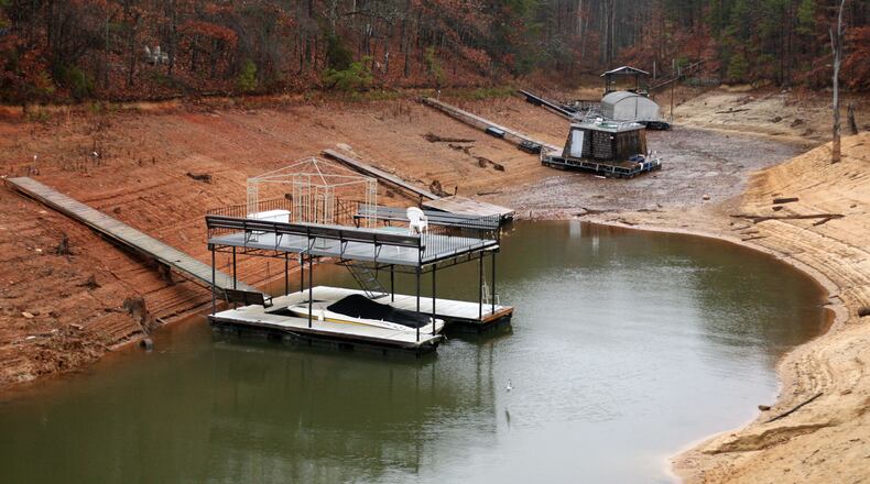 GAINESVILLE, GA: This photo from the 2007 drought of Lake Lanier shows how Georgia's record drought left many boats and docks on on the lake, high and dry. According to the Lake Lanier Association, the lake is projected to be at a healthy elevation of 1071 or above for just about 15% of summer days in this decade. PHIL SKINNER / AJC FILE PHOTO