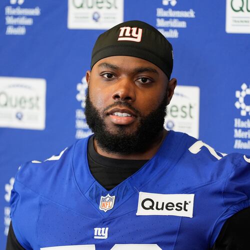 FILE - New York Giants' Andrew Thomas speaks to reporters after NFL football practice in East Rutherford, N.J., May 21, 2026. (AP Photo/Seth Wenig, file)