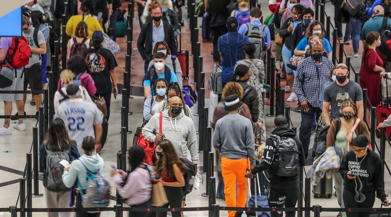 As airlines flights have picked back up in 2021, so have incidents of unruly behavior by passengers. The Federal Aviation Administration has levied record fines against bad actors in 2021. (John Spink / John.Spink@ajc.com)