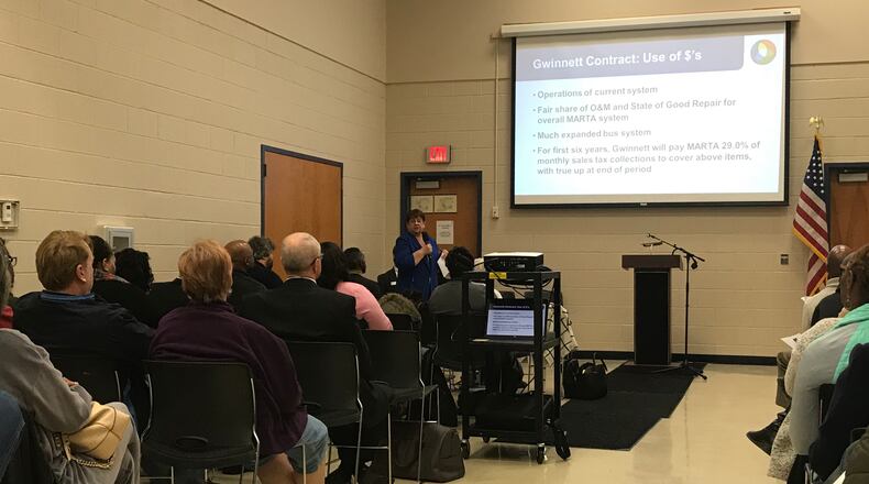Gwinnett Commission Chairman Charlotte Nash talks about Gwinnett's pending contract with MARTA during a townhall meeting hosted Wednesday night at the Centerville Community Center. TYLER ESTEP / TYLER.ESTEP@AJC.COM