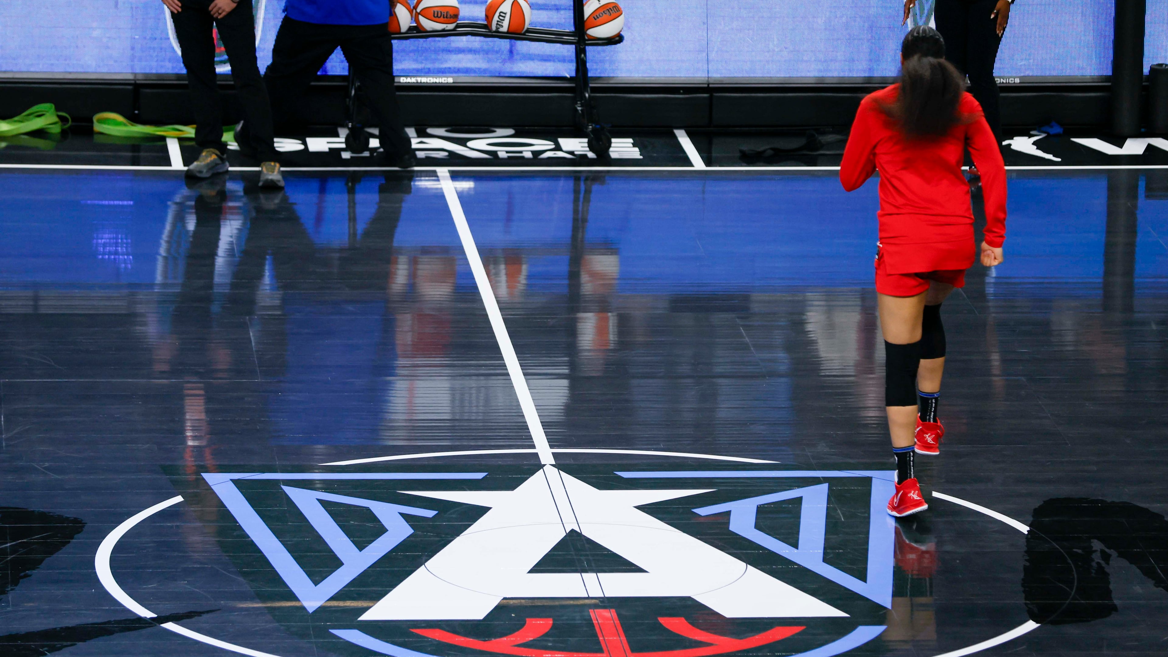 The Atlanta Dream logo is seen on display on the center court at the Gateway Center Arena before the first-round playoff game between the Atlanta Dream and the Indiana Fever on Sunday, Sept. 14, 2025, in Atlanta. (Miguel Martinez/AJC)