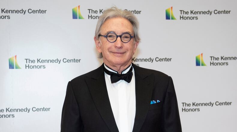 FILE - 2019 Kennedy Center Honoree conductor Michael Tilson Thomas arrives at the State Department for the Kennedy Center Honors in Washington on Dec. 7, 2019. (AP Photo/Kevin Wolf, File)