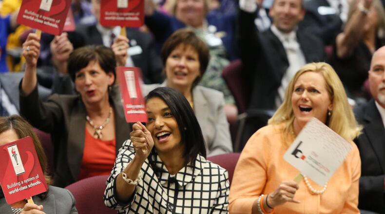 Gwinnett County Public Schools employees celebrate after learning they are the co-recipients of the 2014 Broad Foundation prize in education. AJC FILE PHOTO.