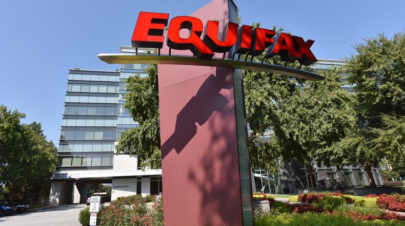 Atlanta-based Equifax is among local companies that plans to start shifting teleworking employees back to corporate offices. HYOSUB SHIN / HSHIN@AJC.COM