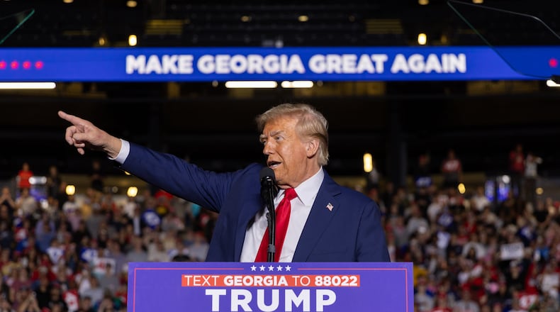 Former President Donald Trump takes the stage for a rally at Georgia Tech's McCamish Pavilion on Monday, October 28, 2024. (Photo: Arvin Temkar / AJC)