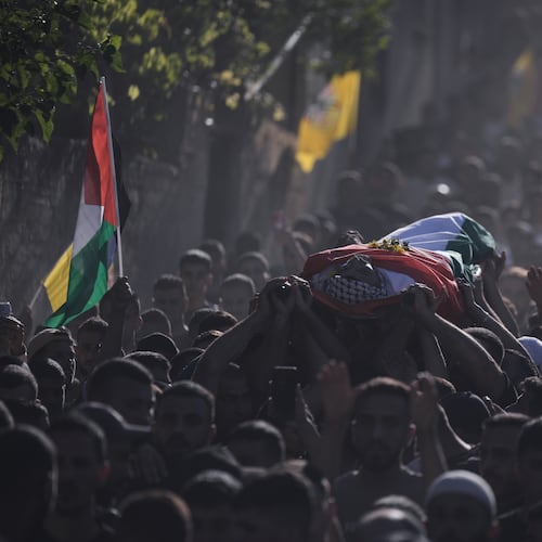 Mourners carry the body of Palestinian Imad Haroun Ishtayeh, 26, who was shot and killed by Israeli forces on Sunday at a concrete barrier separating the occupied West Bank from Jerusalem, during his funeral in the village of Salem, east of Nablus, Sunday, May 31, 2026. (AP Photo/Majdi Mohammed)