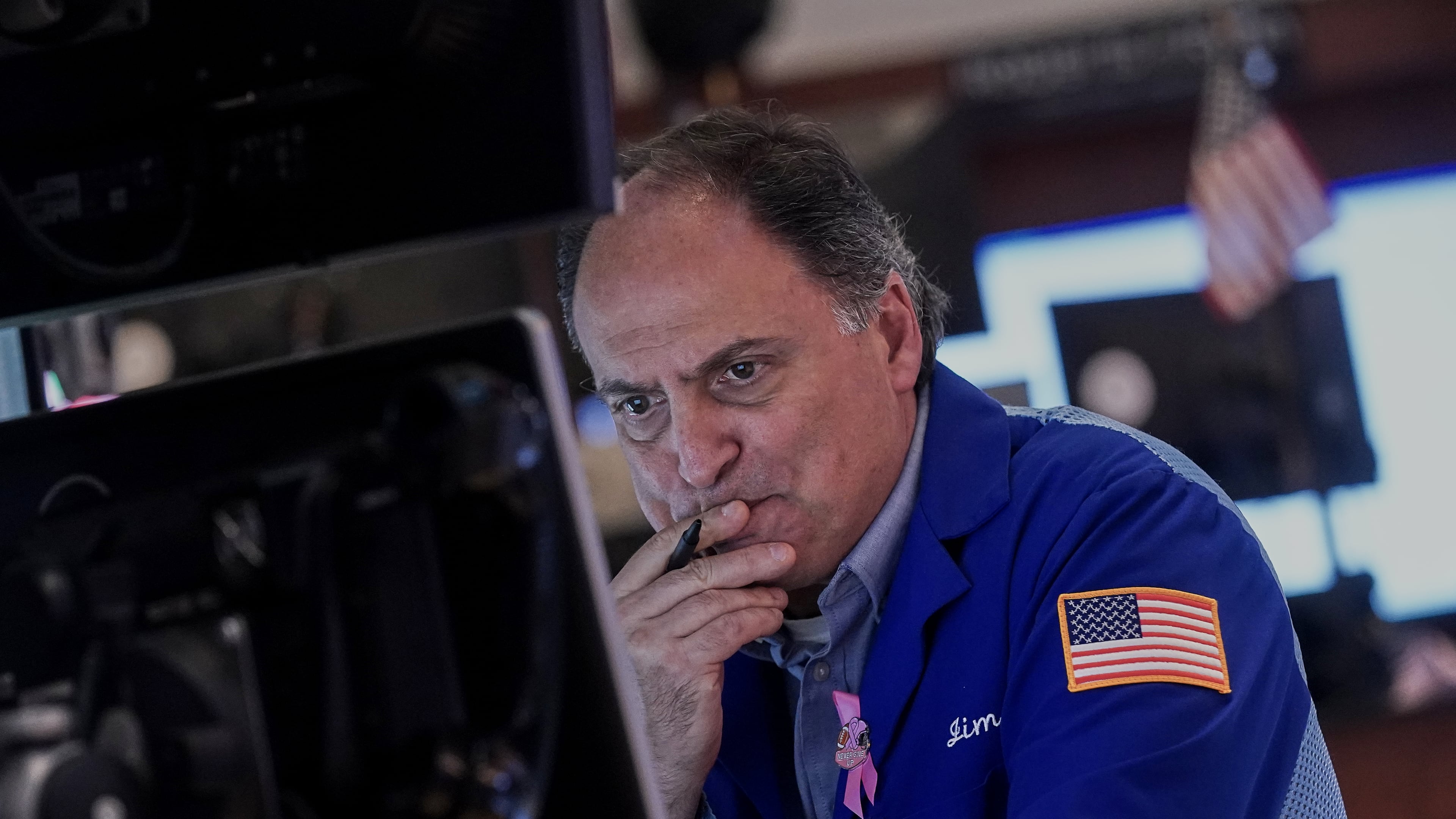 Trader James Conti works on the floor of the New York Stock Exchange, Thursday, Nov. 6, 2025. (AP Photo/Richard Drew)