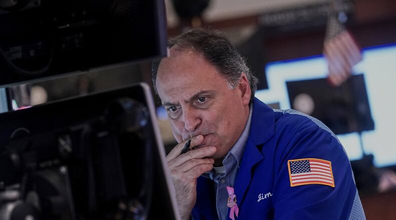 Trader James Conti works on the floor of the New York Stock Exchange, Thursday, Nov. 6, 2025. (AP Photo/Richard Drew)