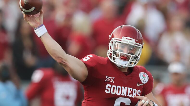 January 1, 2018 Pasadena: Oklahoma quarterback Baker Mayfield completes a pass against Georgia on a scoring drive during the second quarter in the College Football Playoff Semifinal at the Rose Bowl Game on Monday, January 1, 2018, in Pasadena.    Curtis Compton/ccompton@ajc.com