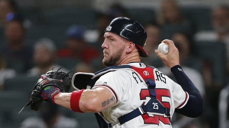 Tyler Flowers and the Braves got a scare when the catcher was hit by a pitch while battig in the sixth inning Wednesday night and immediately had a grotesquely large welt develop on his forearm. (AP Photo/John Bazemore)