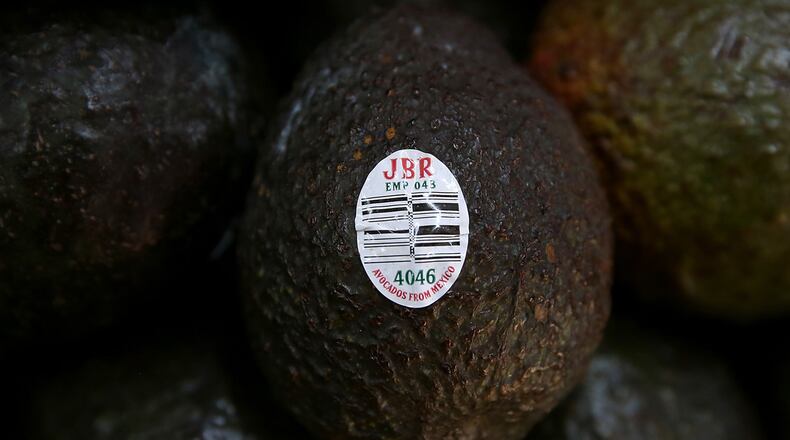 An avocado that was grown in Mexico is displayed in a store at Mercado Hidalgo on January 27, 2017 in Tijuana, Mexico.  President Donald Trump recently threatened to close the border with Mexico.  Experts say the move could make the U.S. run out of avocados within three weeks.