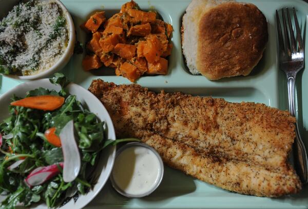 Fried Trout meat-and-three with side salad, curry sweet potato salad, broccolini casserole and a biscuit.(Beckysteinphotography.com)