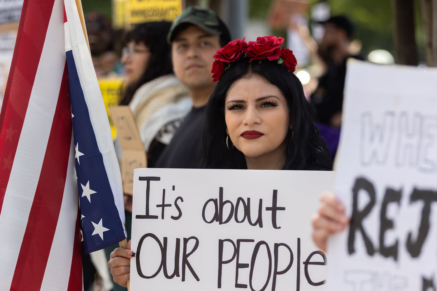 Lily Alberto participates in a protest on ICE raids and deportation arrests on Chamblee-Tucker Road in Atlanta on Saturday, June 14, 2025. (Arvin Temkar / AJC)