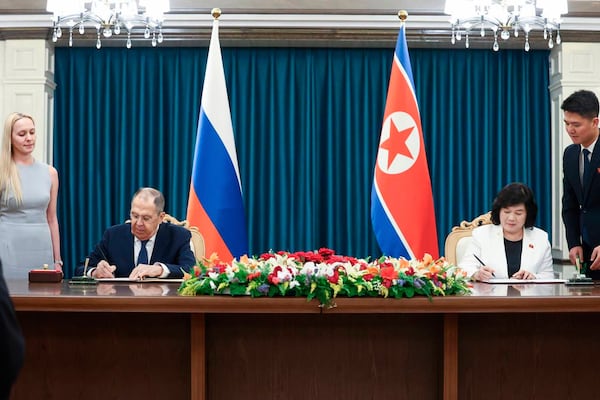 In this photo released by Russian Foreign Ministry Press Service, Russian Foreign Minister Sergey Lavrov, left, and North Korean Foreign Minister Choe Son Hui, right, attend a signing ceremony following their talks in Wonsan, North Korea, on Saturday, July 12, 2025. (Russian Foreign Ministry Press Service via AP)