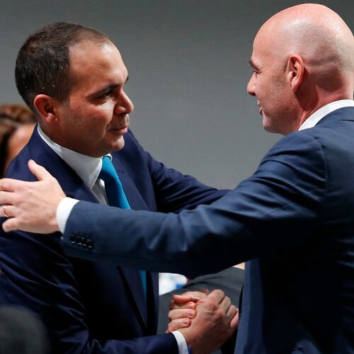 FILE - Newly elected FIFA President Gianni Infantino, of Switzerland, right, is congratulated by fellow candidate Prince Ali Al-Hussein, of Jordan, left, after the second election round during the extraordinary FIFA congress in Zurich, Switzerland, Feb. 26, 2016. (AP Photo/Michael Probst, File)