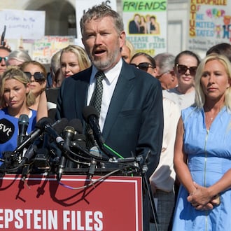 Rep. Thomas Massie, R-., is joined on Capitol Hill by Rep. Marjorie Taylor Greene, R-Ga. (right), and survivors of Jeffrey Epstein's abuse Sept. 3, 2025, calling for release of the Epstein files. (Rod Lamkey Jr./AP)