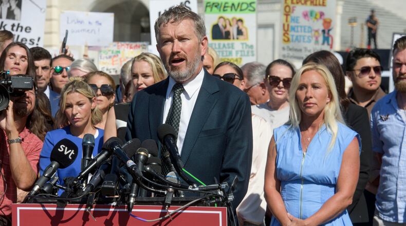 Rep. Thomas Massie, R-., is joined on Capitol Hill by Rep. Marjorie Taylor Greene, R-Ga. (right), and survivors of Jeffrey Epstein's abuse Sept. 3, 2025, calling for release of the Epstein files. (Rod Lamkey Jr./AP)