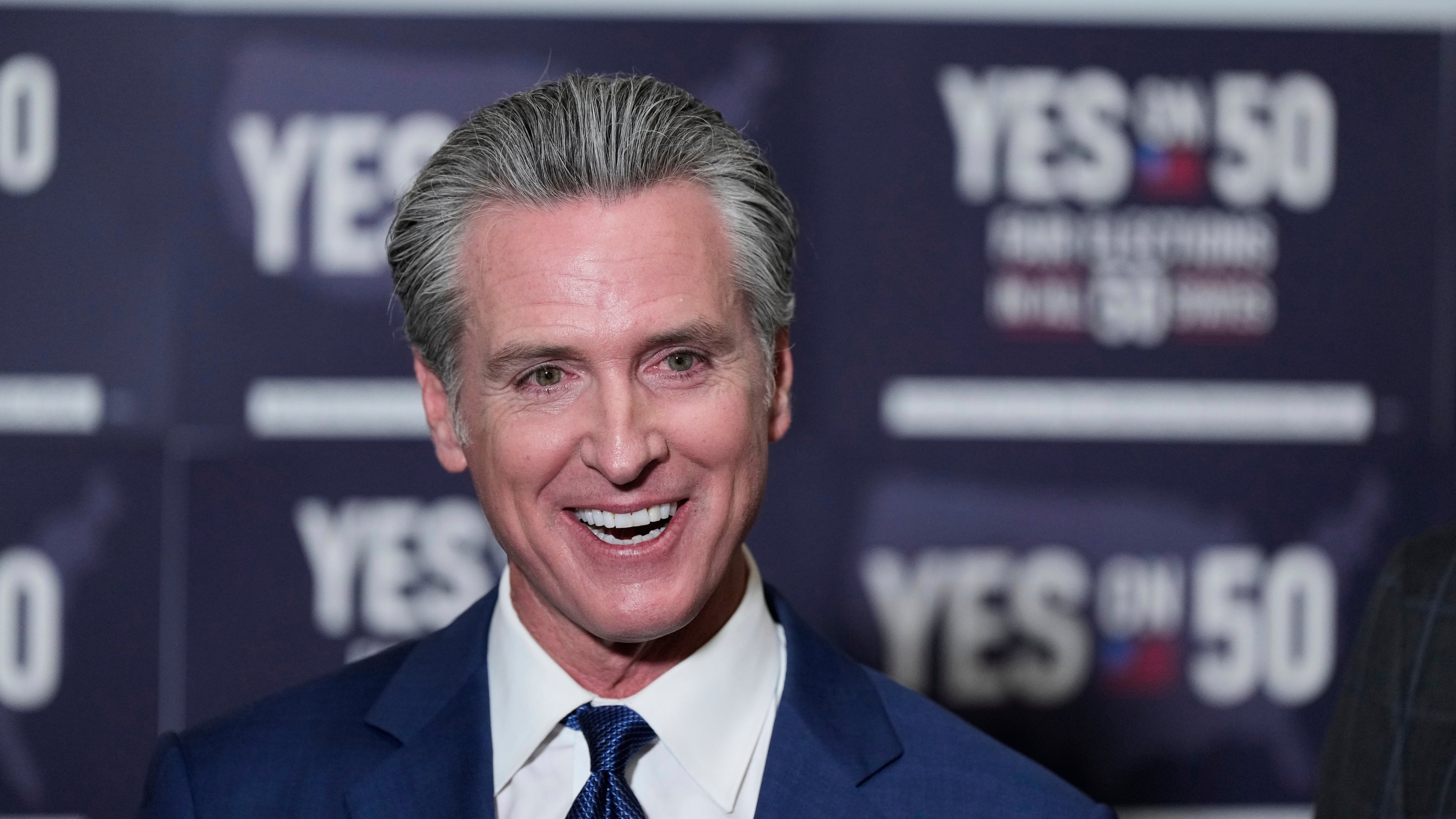 California Gov. Gavin Newsom answers questions after signing legislation calling for a special election on a redrawn congressional map on Thursday, Aug. 21, 2025, in Sacramento, Calif. (AP Photo/Godofredo A. Vásquez)